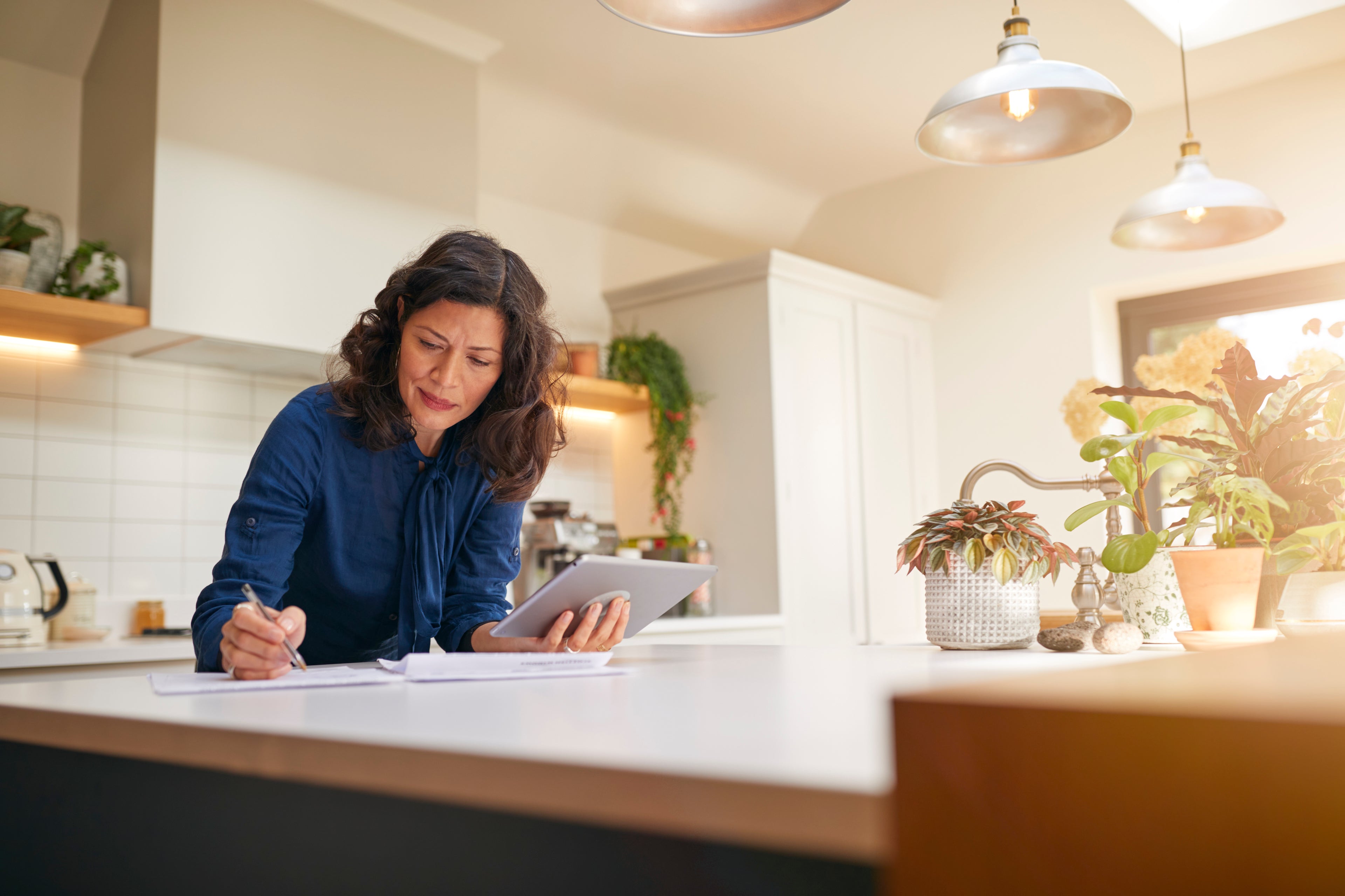 A woman looking over her own Social Security documents.
