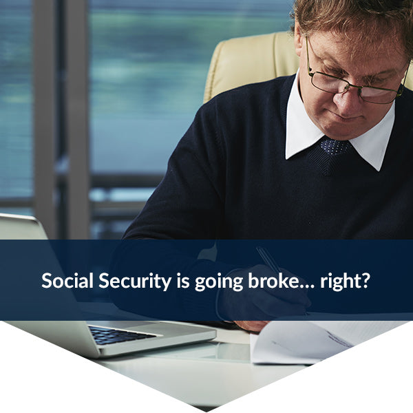 Man going through documents at a desk with a laptop. Text: Social Security is going broke... right?